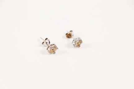 Pair of diamond-set stud earrings. 
Weight: 1.33 g