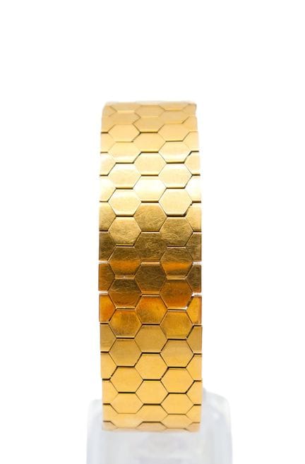 Pulsera tipo manguito de oro (750) con eslabones e