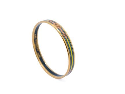 HERMES
Pulsera tipo brazalete de metal dorado esma