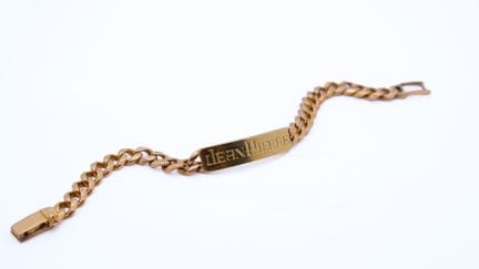Pulsera de oro amarillo (750), con la inscripción 