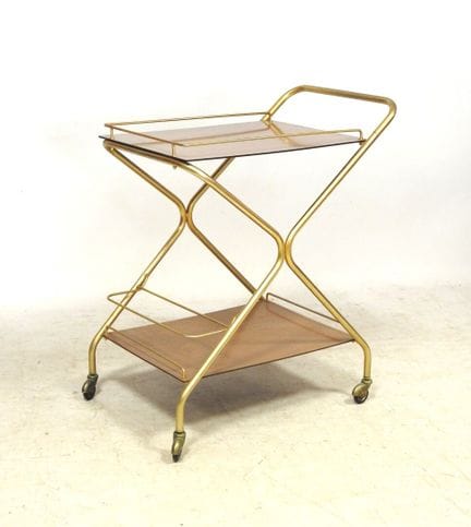 Piece from the 1950s
Rolling serving cart with two