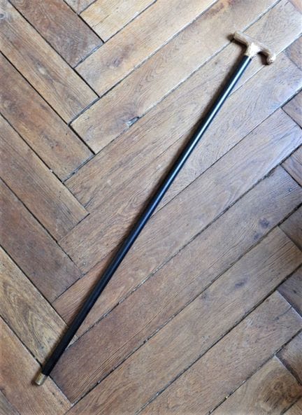 BASTONE in legno annerito con pomello in vermeil. 