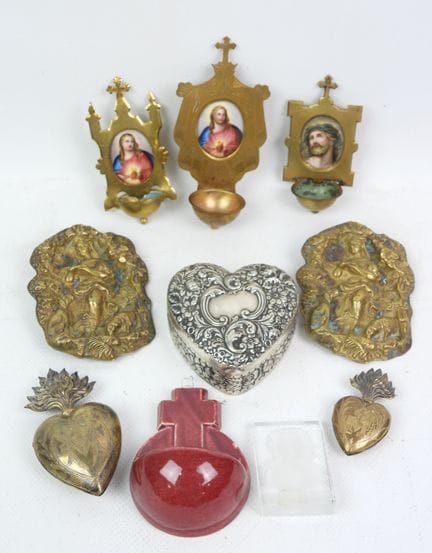 A collection of objects made of brass, silver plat