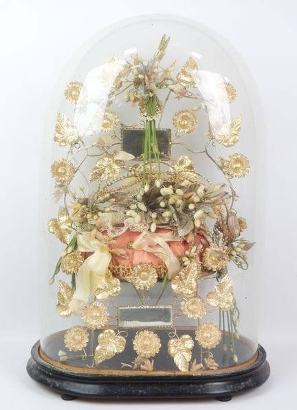 Bride figurine with a crown, mounted on a brass st