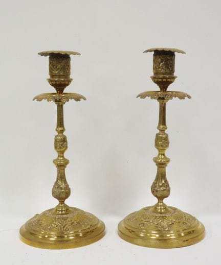 PAIR OF BRONZE CANDLESTICKS with floral and shell 
