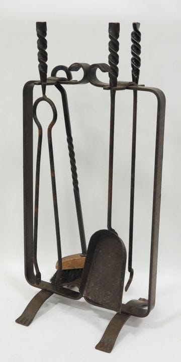 Wrought-iron fireplace set including a shovel, ton