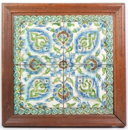 Four Iznik-style earthenware tiles with floral des