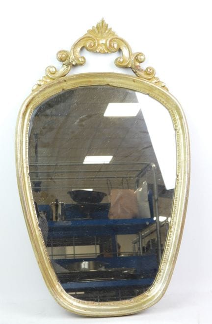 Silver-plated wooden mirror with a pediment decora