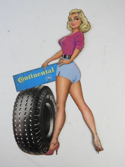 CONTINENTAL  : Pin-up en tôle polychrome. H. : 44 