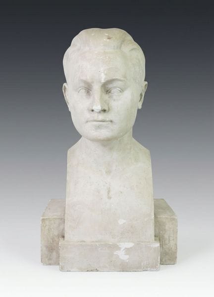 Bust of a man, viewed from the front. Plaster scul