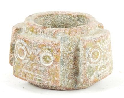 CHINA. Hardstone bowl decorated with carved heads.