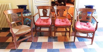 CUATRO SILLONES de paja con respaldo calado con mo