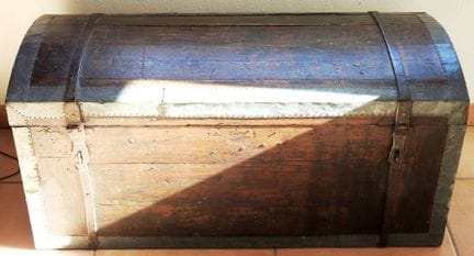 Antique arched oak chest with pewter hardware.
49 