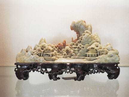 CHINA
A hardstone sculpture depicting an idyllic v