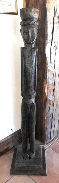 Large, life-size totem sculpture carved directly f