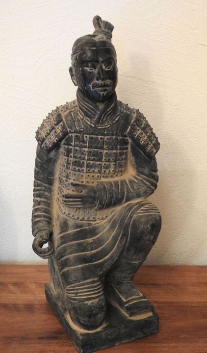 CHINA
Patinated terracotta warrior with a removabl