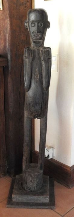 Large, life-size totem sculpture carved directly f
