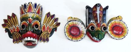 SRI LANKA
Two Mayura-Raksha-style masks featuring 
