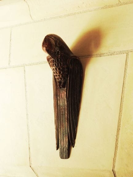 Decorative wooden piece with a weathered finish an