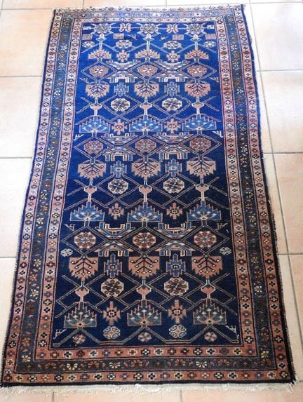 Two rectangular, hand-knotted Persian rugs in shad