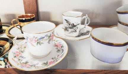 Collection of porcelain cups and saucers, includin