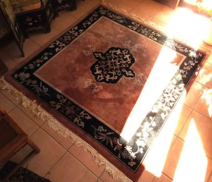 CHINA
Rectangular wool rug with a floral design on