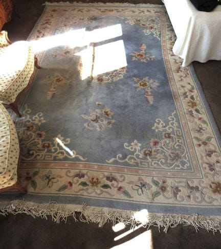 CHINA
Large wool rug with a sky-blue background an
