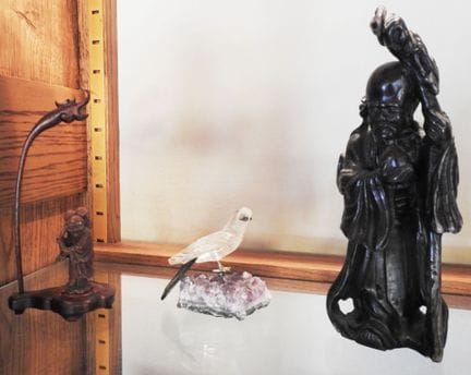 FAR EAST
A composition featuring a boxwood figure,