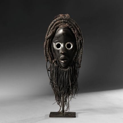 Dan, Ivory Coast - Mask. Wood with black patina, m