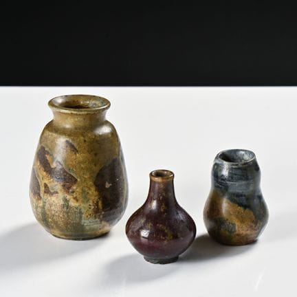 Eugène LION (1867–1945)

Set of three brown-glazed