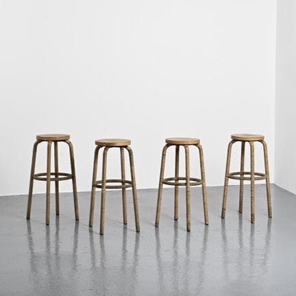 STELLA FRANCE

Suite of four high wooden stools wi