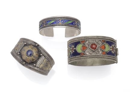 Two open bracelets and one rigid bracelet made of 