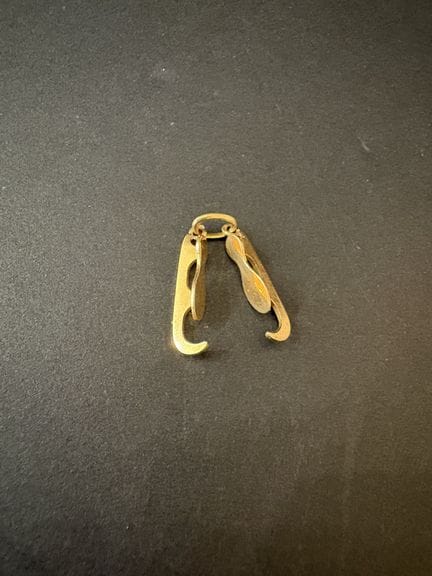 Anhänger oder Charms aus 750er Gold, die ein Paar 