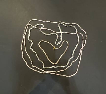 Set aus drei Halsketten oder einer langen Kette au