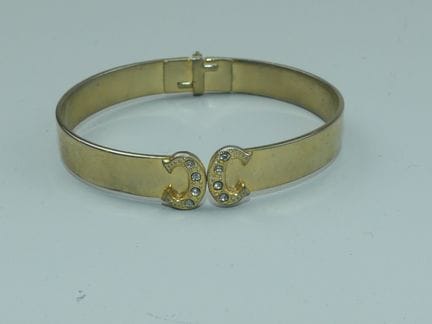 CHANEL (im Stil von). Armband mit zwei C-Motiven u