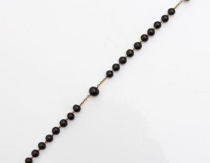 Chaine en métal doré composée de perles fantaisies