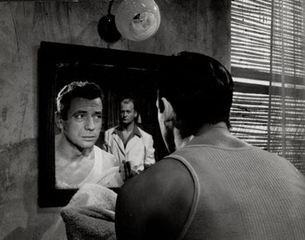 CURD JURGENS E YVES MONTAND
Miradas cruzadas en un