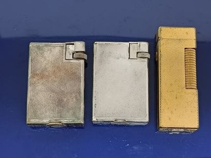 Set of three lighters, including a DUNHILL and var
