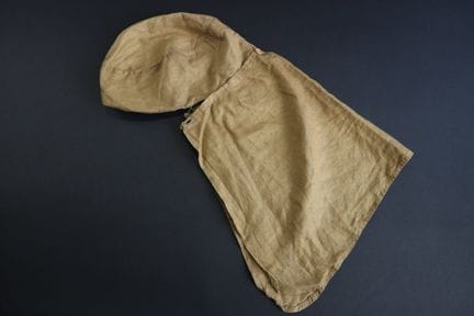 Käppi mit Nackenschutz, aus Kaschu-Leinen. ABE (ge