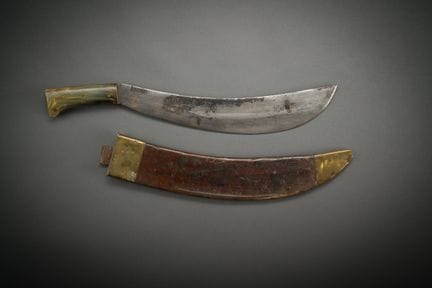Machette américaine. Plaquettes en corne. Lame cou