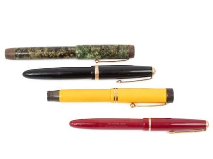 PARKER
4 stylos plume Duofold : vert strié, noir m