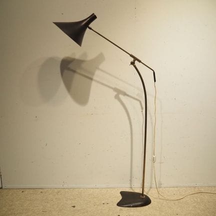 Reading lamp, circa 1950: Brown-lacquered metal sh