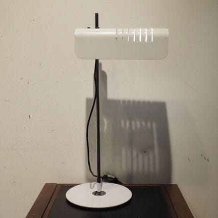 Desk lamp, circa 1970, with a shade featuring a wh