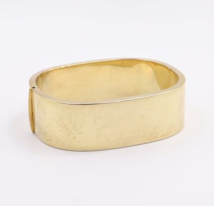 Bracciale a manicotto
In oro giallo 14k (585) con 
