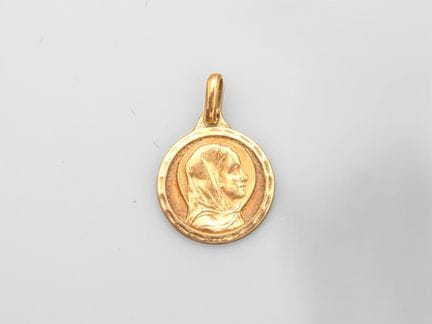 Religious medal in 750°/°° (18K) yellow gold, with