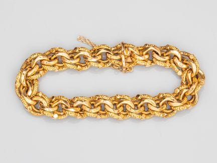 750°/°° (18K) yellow gold bracelet with a braided 