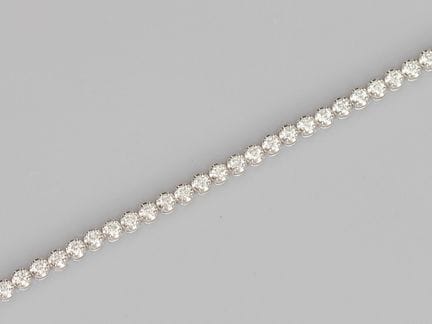 750°/°° (18K) white gold "rivière" diamond bracele