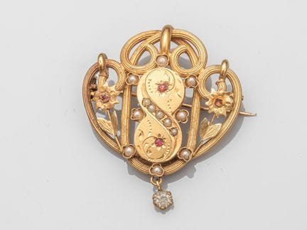 Schneckenbrosche aus 750°/°° (18 K) Gelbgold, bese