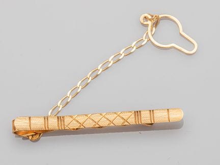 Krawattenklammer aus 750°/°° (18 K) Gelbgold mit G