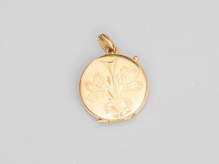 Round keepsake medallion in 750°/°° (18K) yellow g